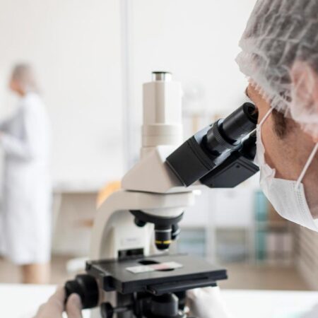 What is a NATA laboratory? A scientist analysing workplace drug testing samples in a NATA accredited laboratory